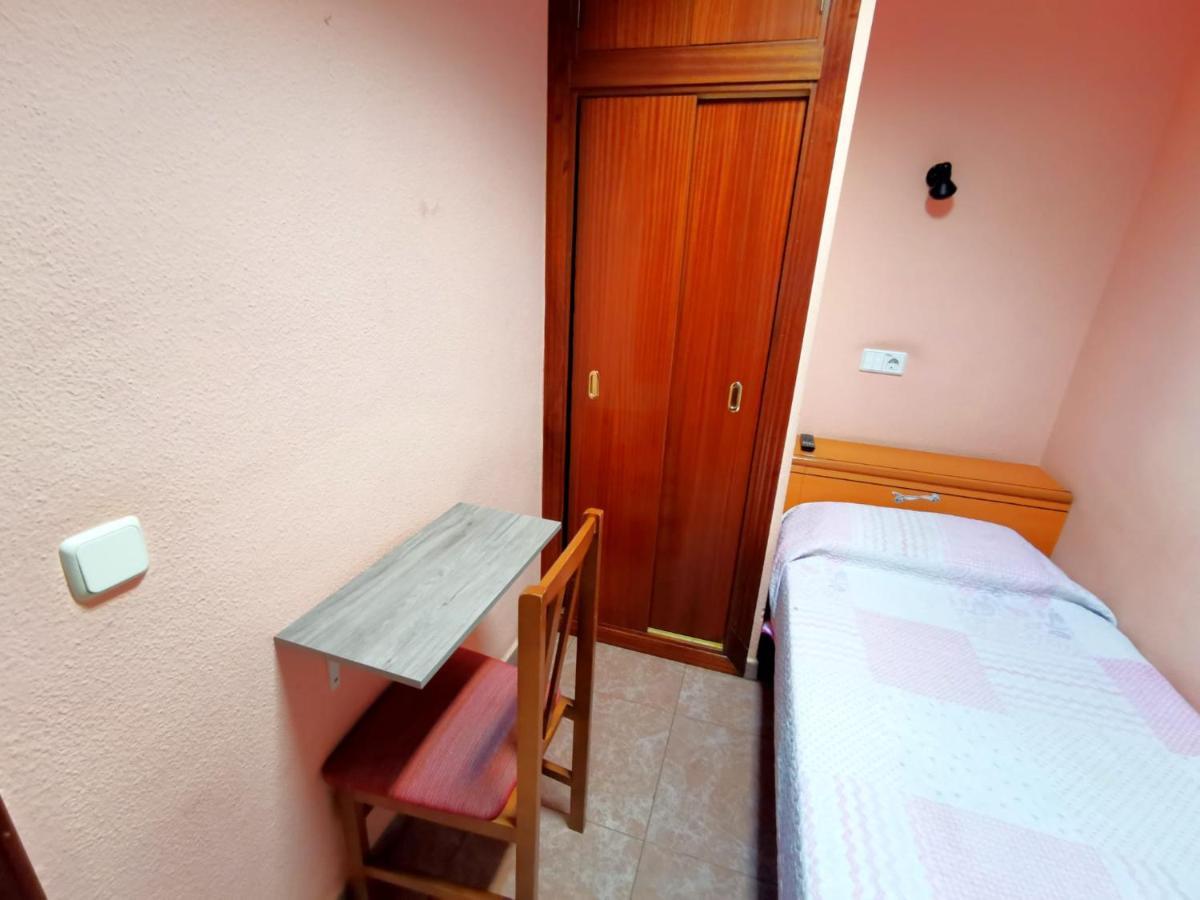 Quarto Individual com Casa de Banho Partilhada