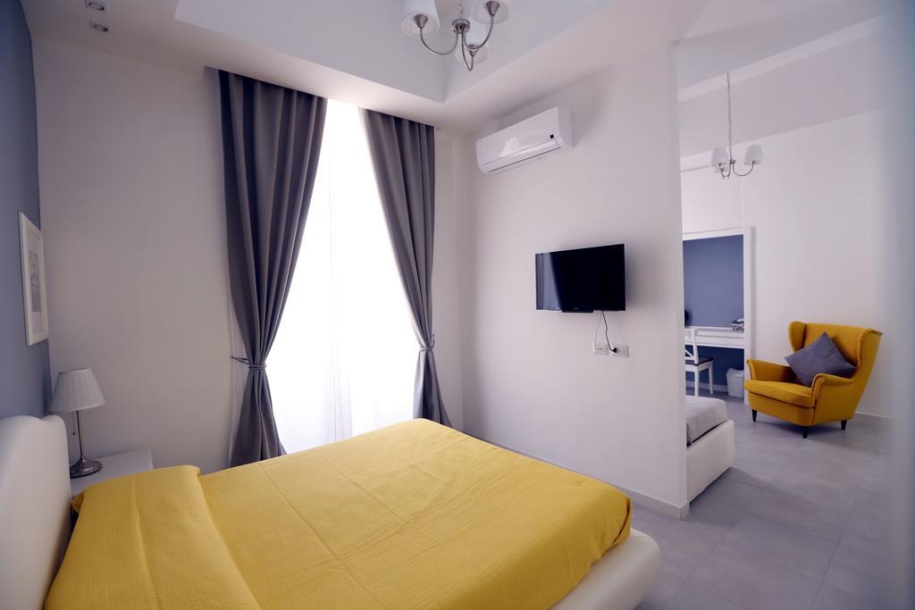 Deluxe Quadruple Room,128030229:JPEG