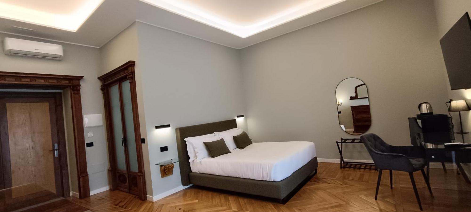 Deluxe Quadruple Room with Balcony,1516906840:JPEG