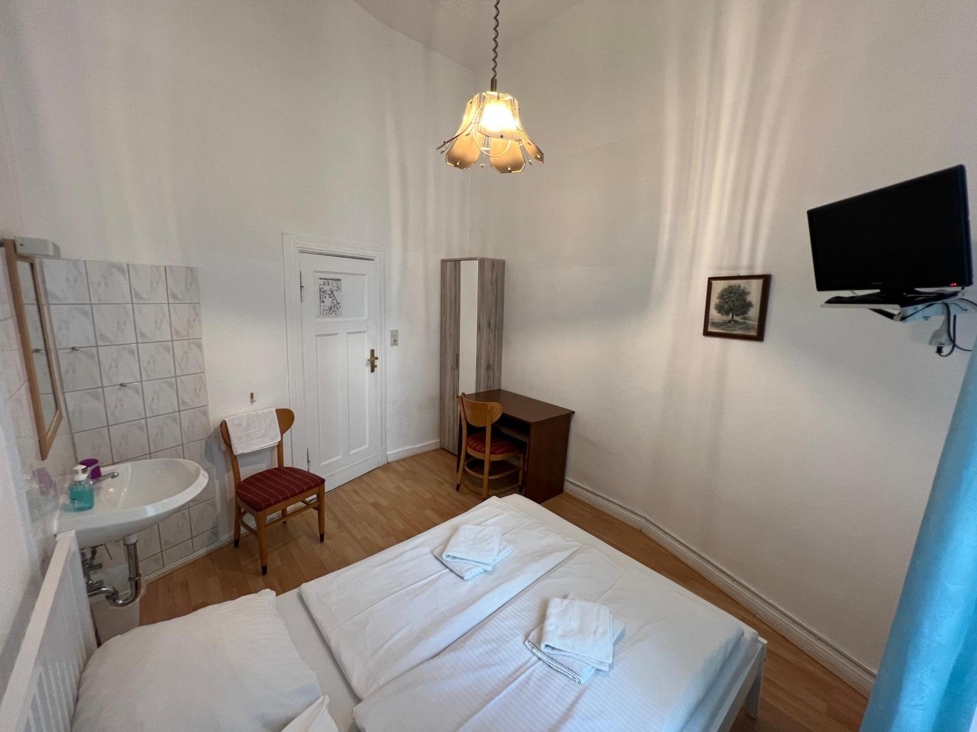 Standard Double Room with Shared Bathroom