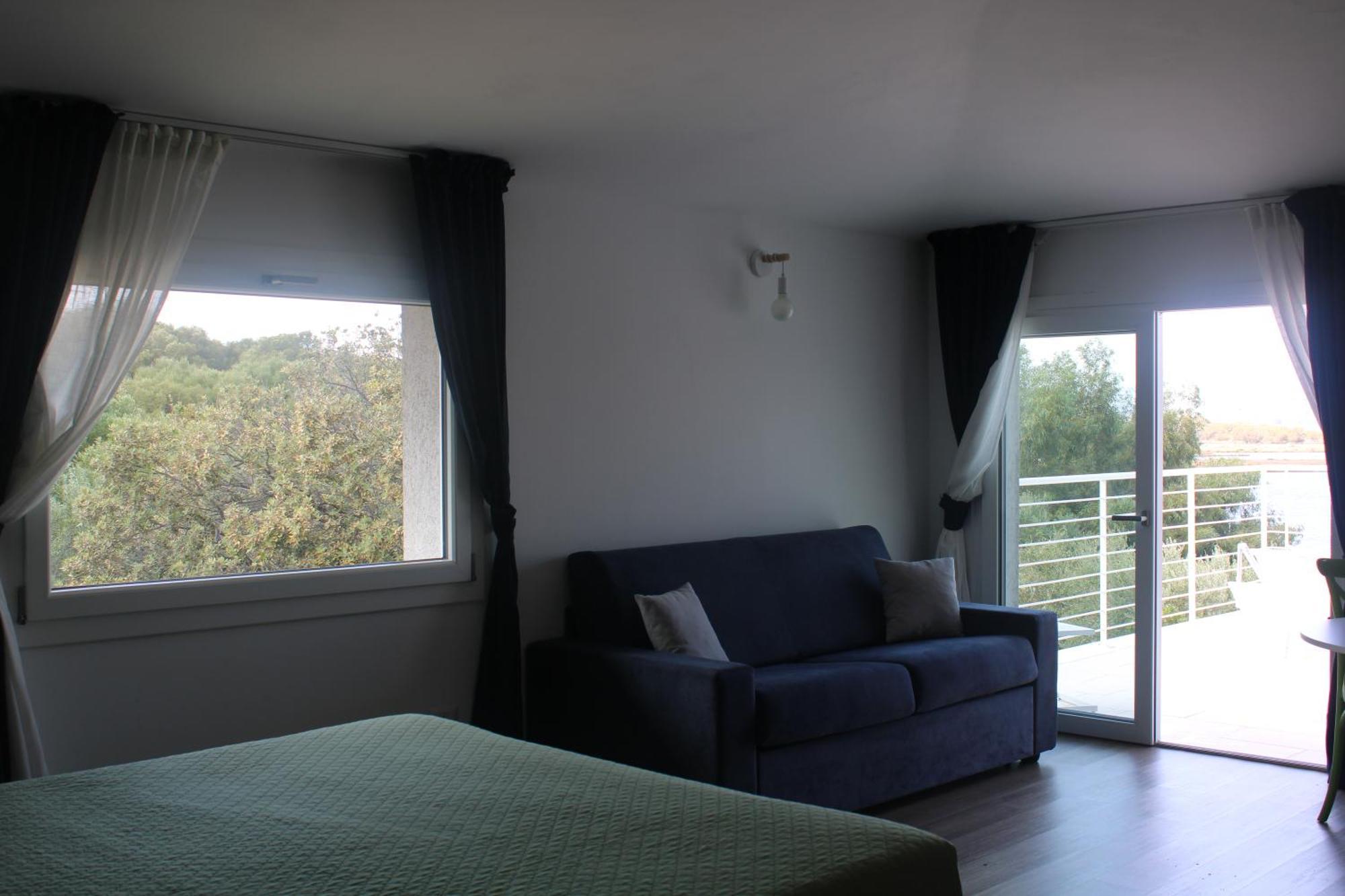 Quarto Quádruplo com Vista do Mar.