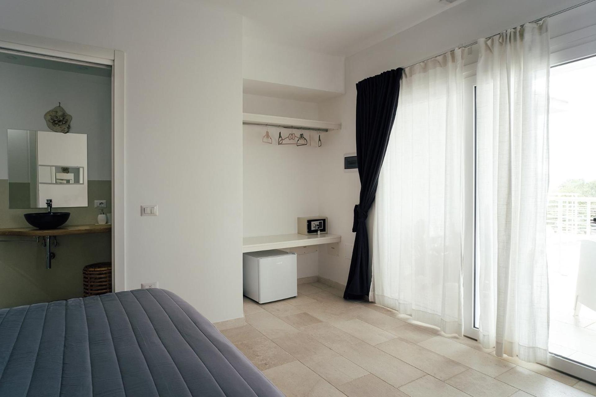 Quarto Duplo com Varanda e Vista do Mar