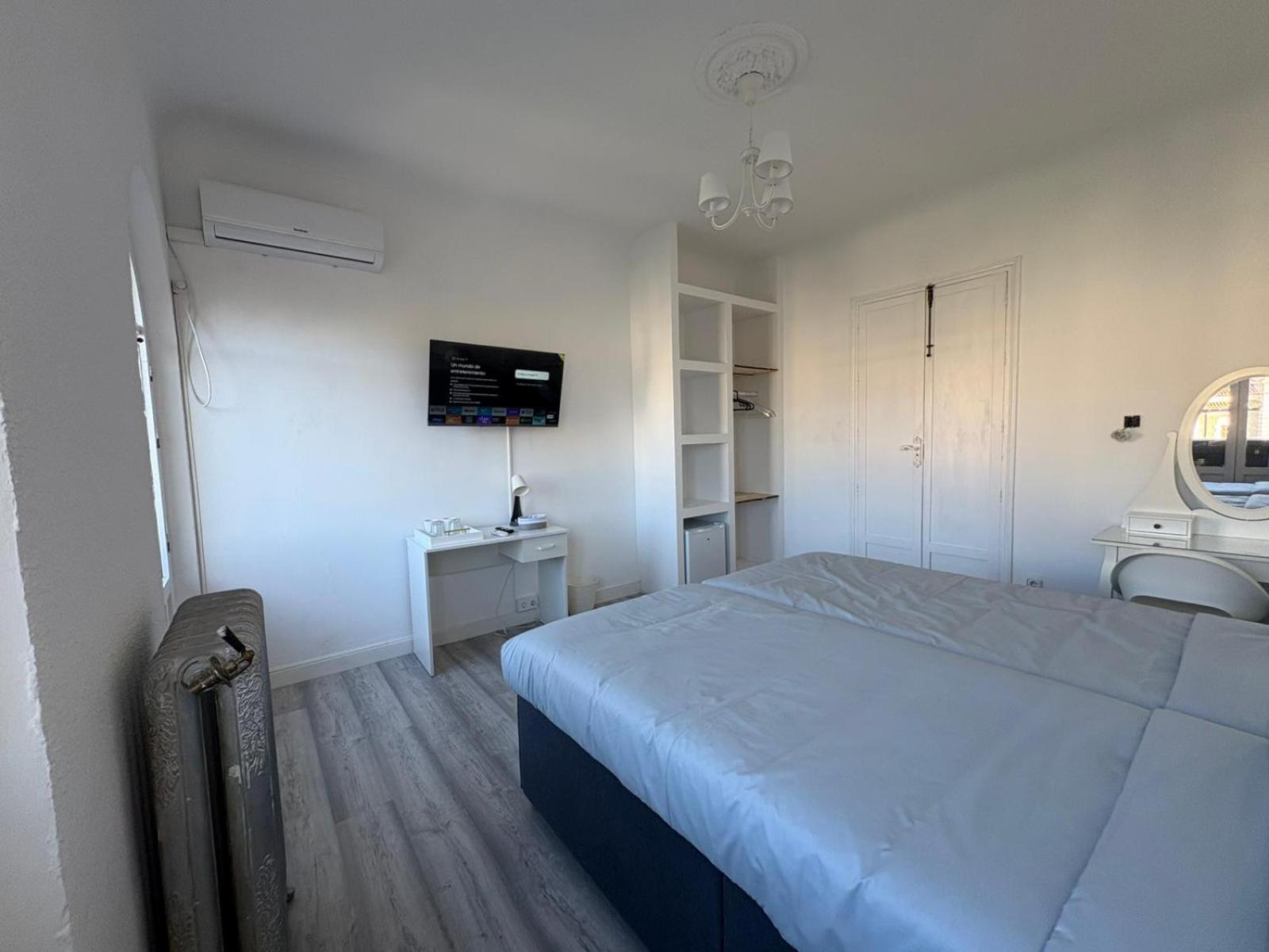 Tweepersoonskamer met 1 of 2 Bedden en Gedeelde Badkamer
