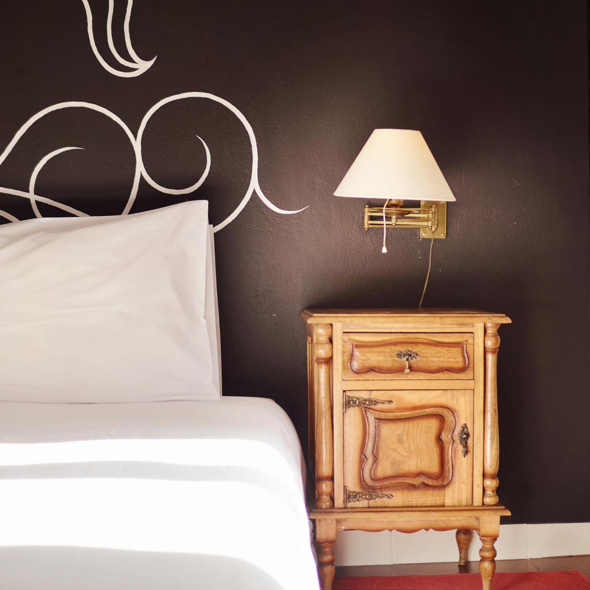 Quarto Quádruplo Superior com Banheiro Compartilhado