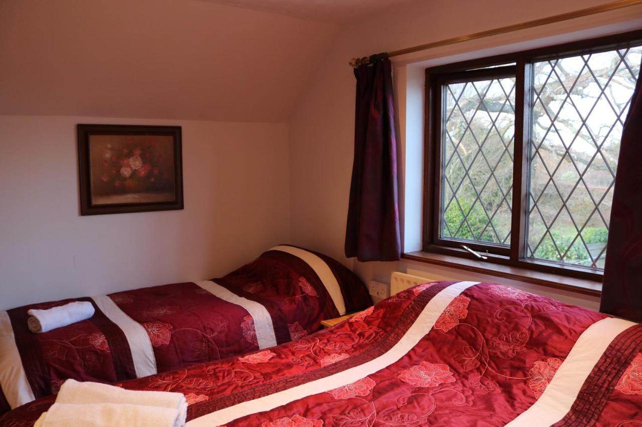 Family Room with Shared Bathroom and Garden View
