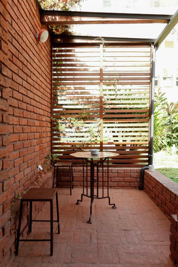 Junior Suite met Patio en Uitzicht op de Tuin