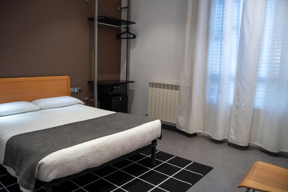 Quarto Duplo com Casa de Banho Partilhada
