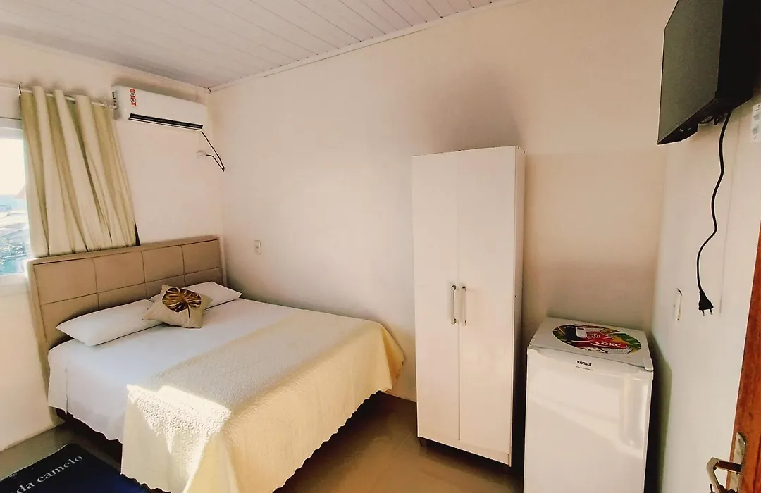 Camelo locação de Suítes Individuais Pousada com Cozinha e Sala Compartilhada-1
