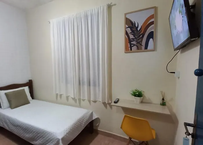 Quarto Individual em Hospedaria no Centro