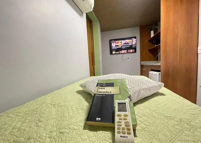 STUDIO aconchego, com Ar, Wifi, Smartv e Cozinha