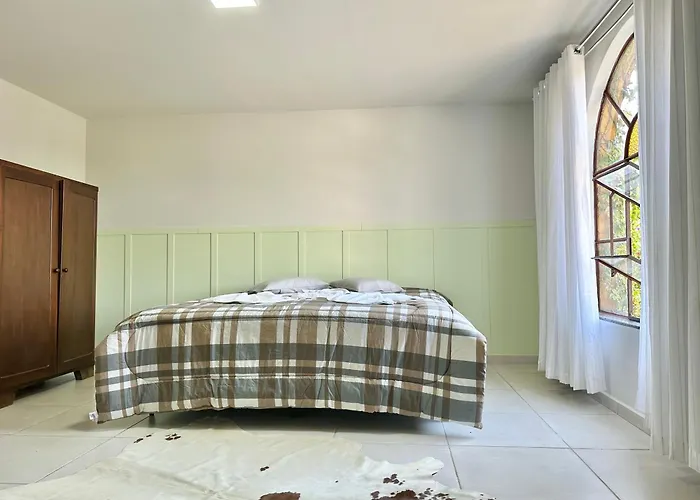 Suíte na casa amarela