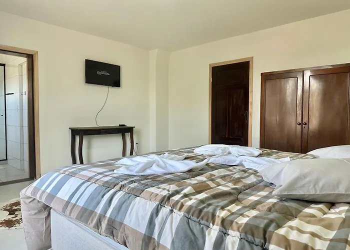 Suíte na casa amarela