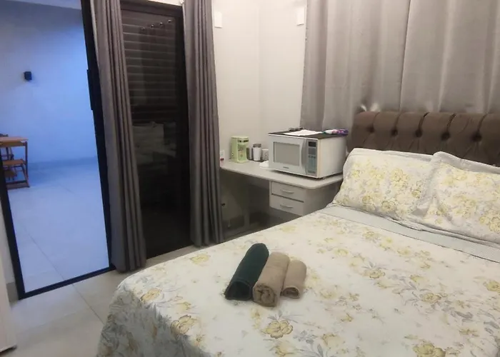 Suíte Aconchegante e Garagem Grátis - Até 4 Pessoas