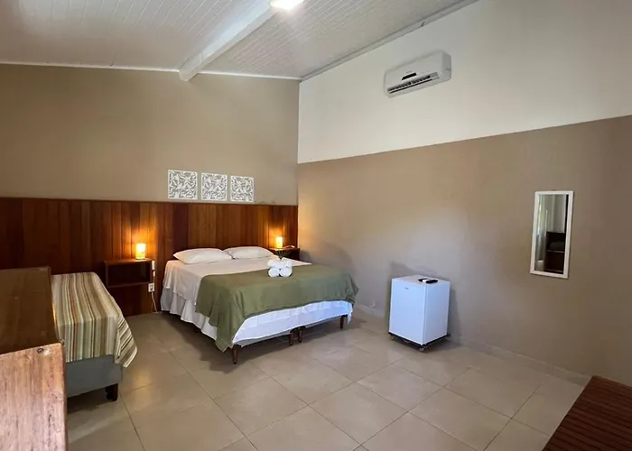 Suítes Curió - Passarim Hospedagem