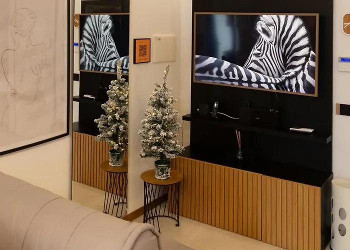 Dislocati BnB - Jacuzzi privata - Cucina - TV60 - Minimal Luxury