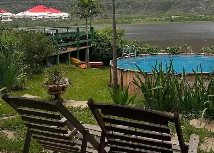 Quintal da prainha Bar - pousada simples-beira da lagoa
