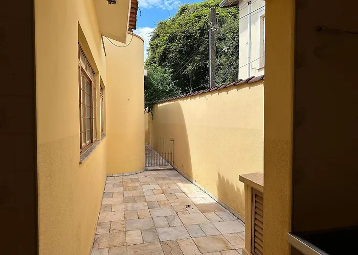 Quarto Elegante - Casa com piscina no Centro