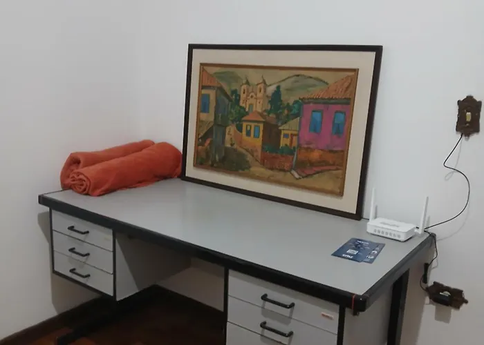 Home office solteiro aconchegante no Centro de Poços de Caldas