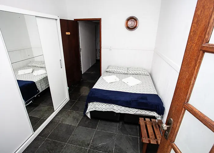Espaço Sideral - Quartos com ar-condicionado, 5min Estádio Maracanã, 8min UERJ, shopping, 12min metrô, wi-fi 300mbp, ampla área comum com cozinha - prático e confortável