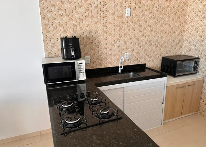 Suite2 com ar condicionado e a Beira mar , cozinha compartilhada e completa Micro ondas air fryer forno elétrico fogão Geladeira freezer gelagua e cafeteria elétrica Tudo para vc se sentir em casa além de um Deck com churrasqueira vista mar