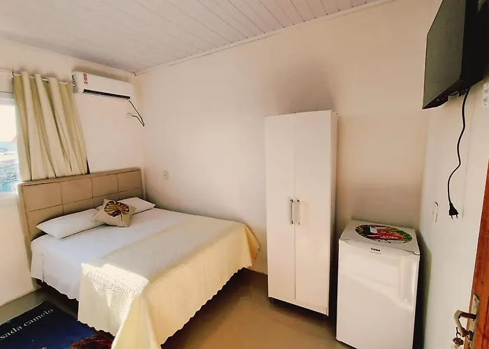 Camelo locação de Suítes Individuais Pousada com Cozinha e Sala Compartilhada