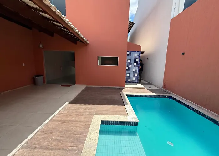 Suíte master com Acesso Total à Casa de Luxo com Piscina e Área Gourmet